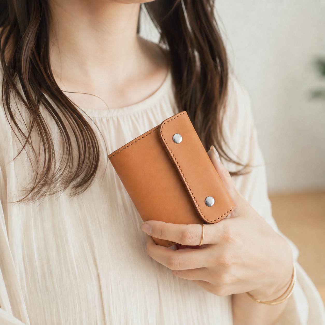 A cute tri-fold mini wallet with a puffy silhouette