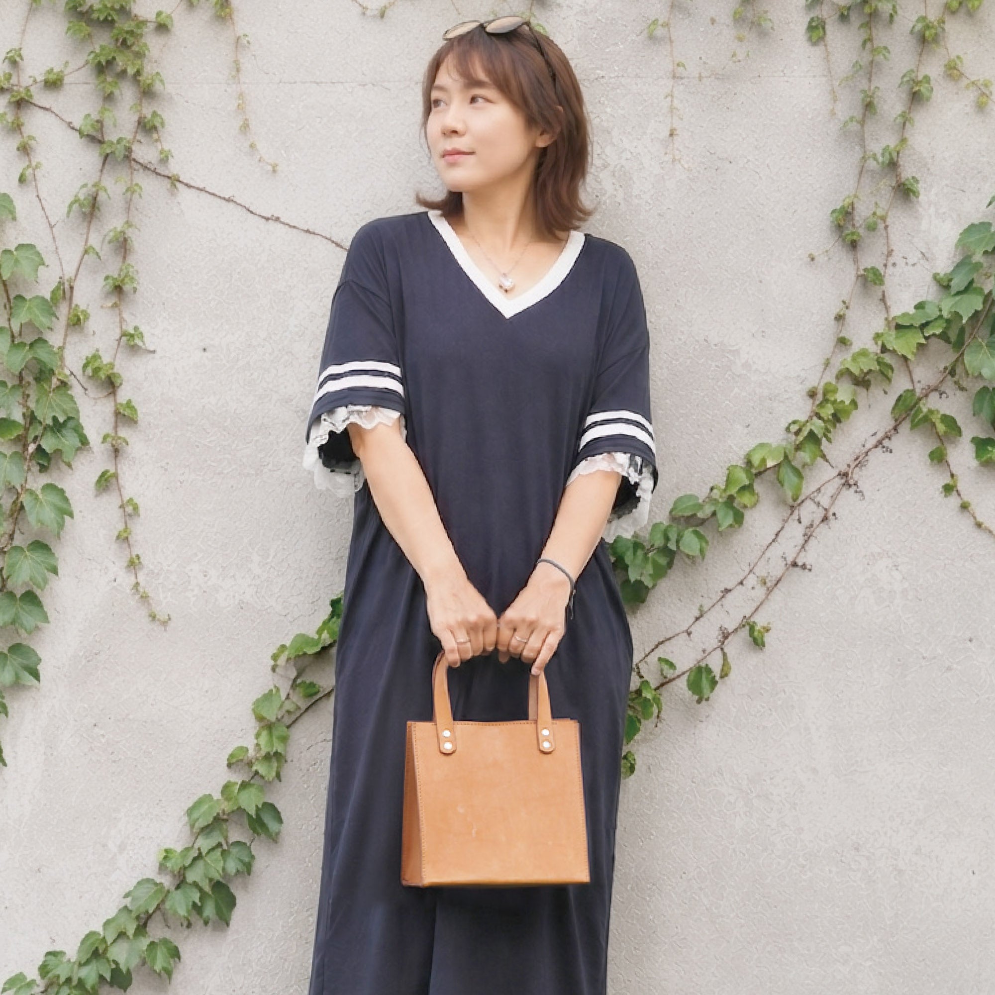 Boxy bag with a wide opening