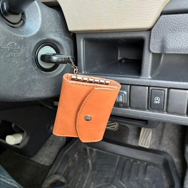 All-in-one key case that holds cards and a smart key