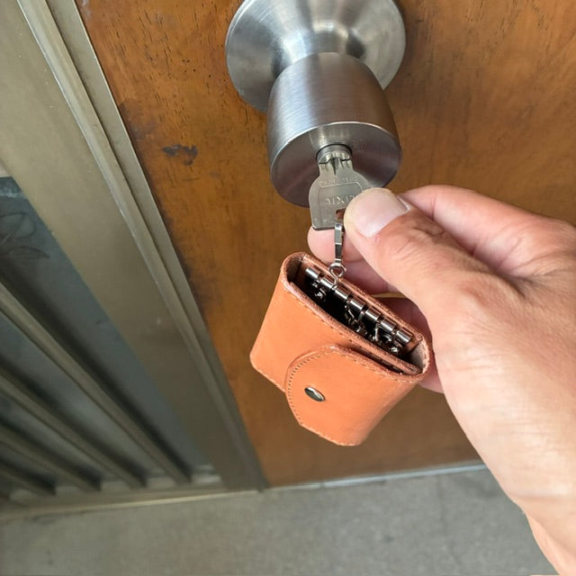 All-in-one key case that holds cards and a smart key