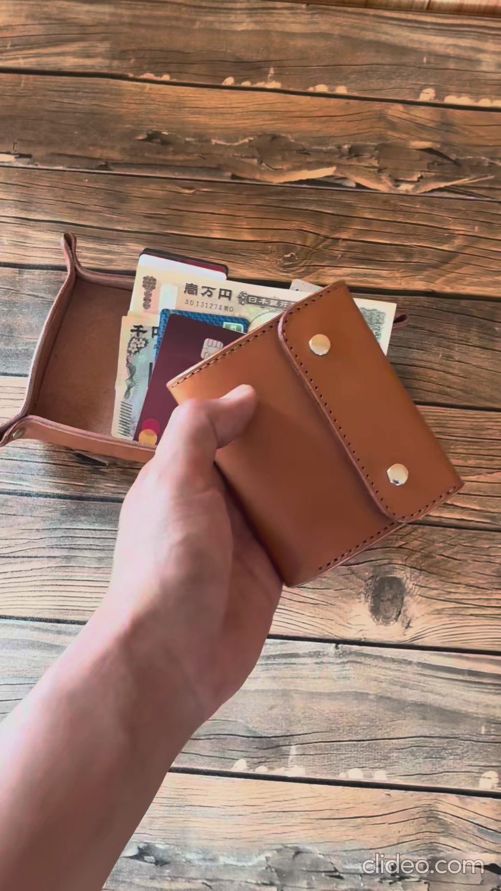 A cute tri-fold mini wallet with a puffy silhouette