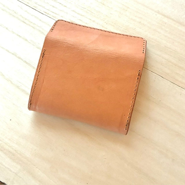 A mini wallet that effortlessly fits bills and offers ample storage