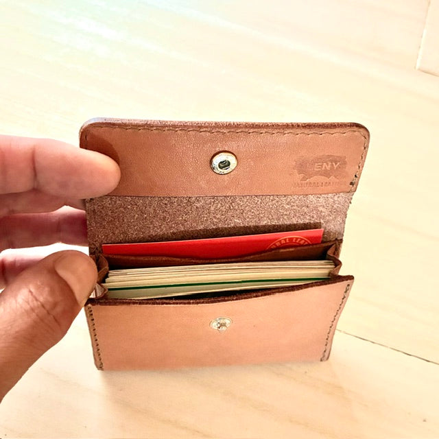 A mini wallet that effortlessly fits bills and offers ample storage